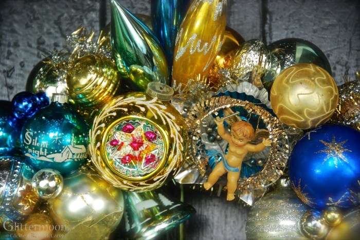 Here is the little Fontanini cherub at the very top.