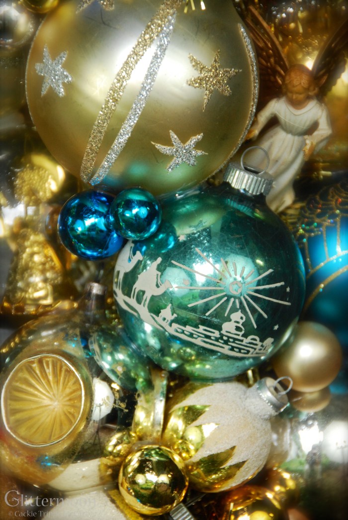 I try to keep to my theme throughout my wreaths.  This is a fabulous ball with the Three Wise Men making their way to Bethlehem.  There are many other nods to the nativity scattered throughout.