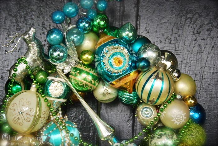 Detail of the top with that glorious Austrian indent ornament, the big spray, and a silver reindeer.