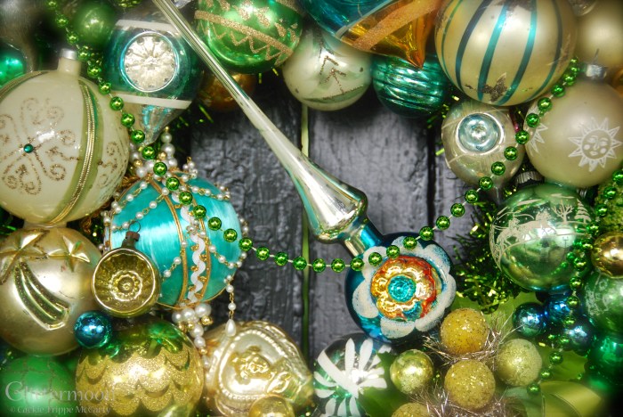 A close-up of the center of Sea Green, showing the beautiful indented topper and that over-the-top aqua pin art ball.